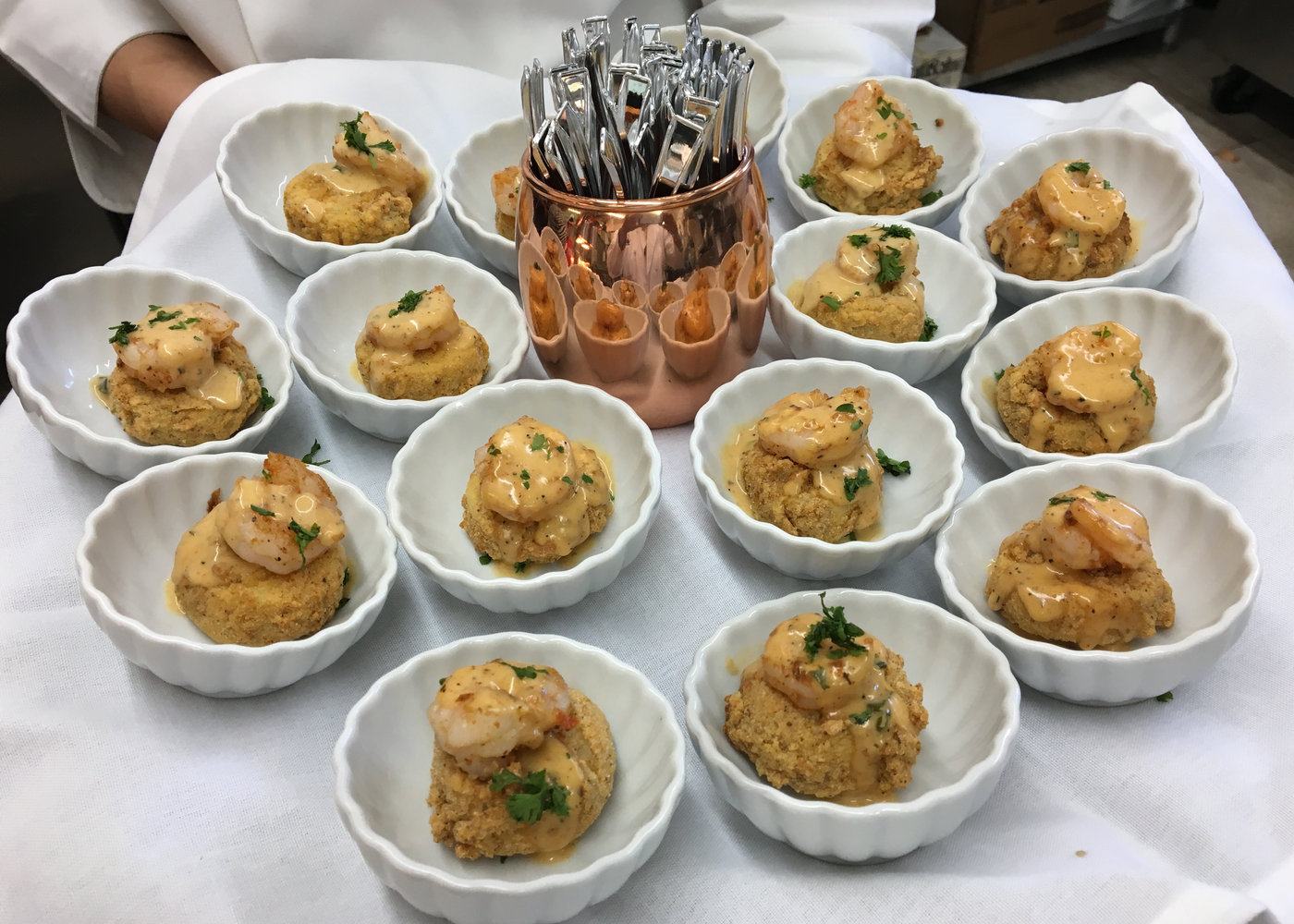 Individual seafood bites plated for a Morel's catered event