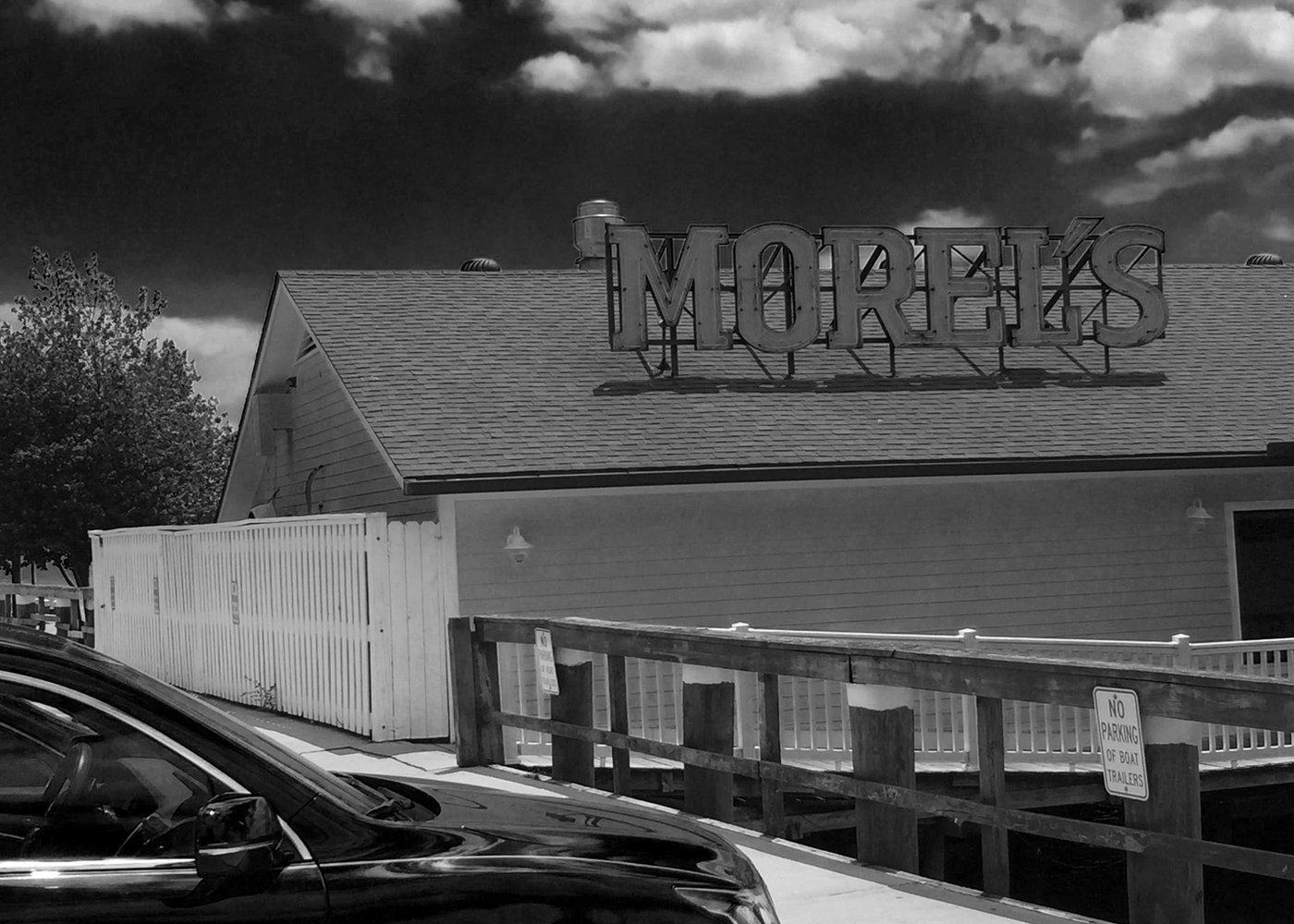 The Morel's Restaurant sign above the waterfront building in New Roads, Louisiana