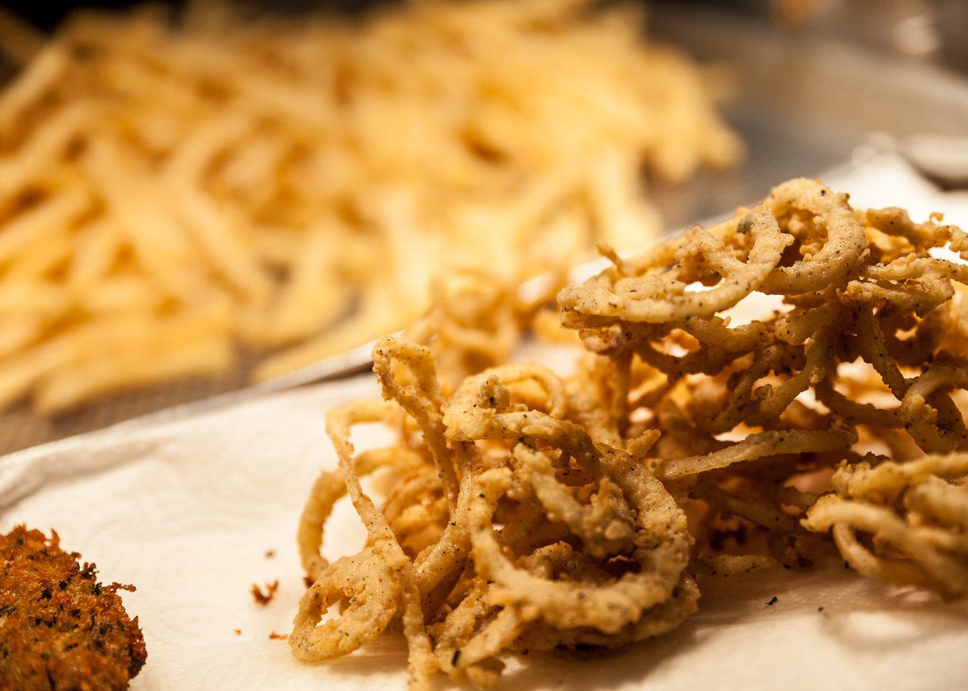 Tall stack of Morel's house-made Mile High onion rings