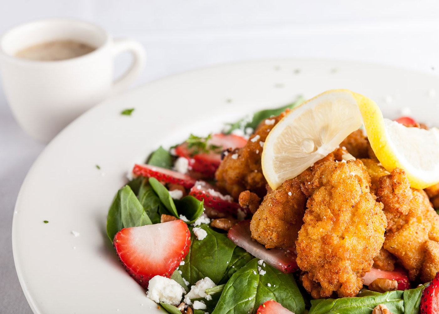 Seafood Sensation salad with fried shrimp over mixed greens